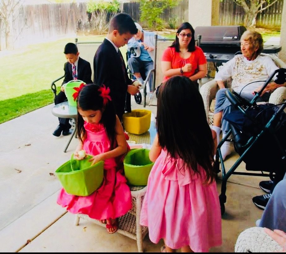 Children visiting residents for a celebration